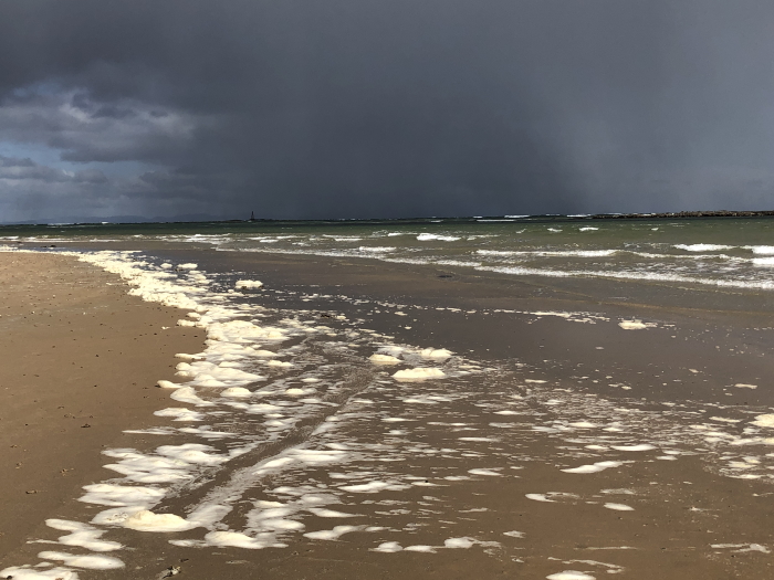 Spume and showers, West Beach, Lossiemouth